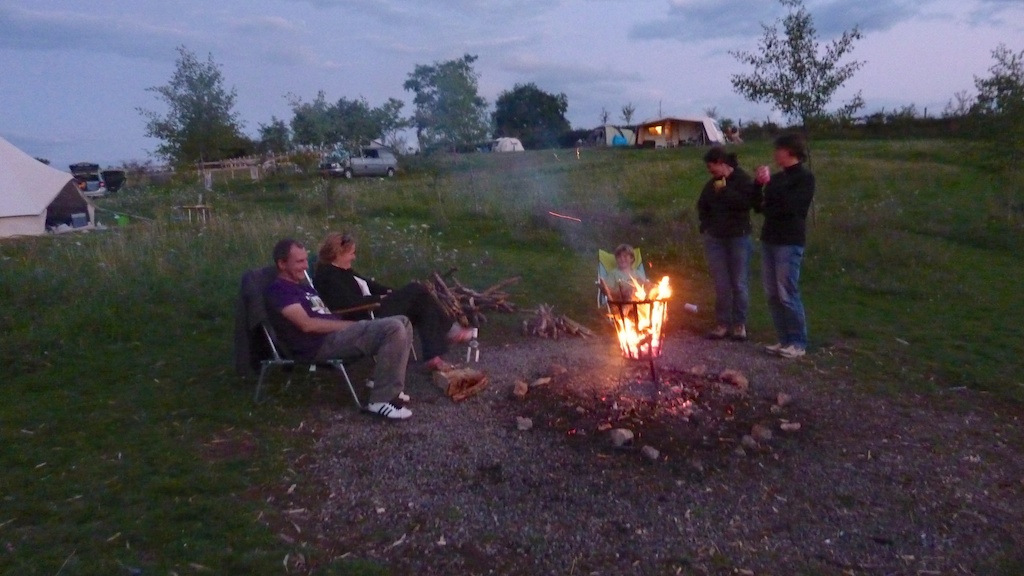 Enjoying a campfire at night